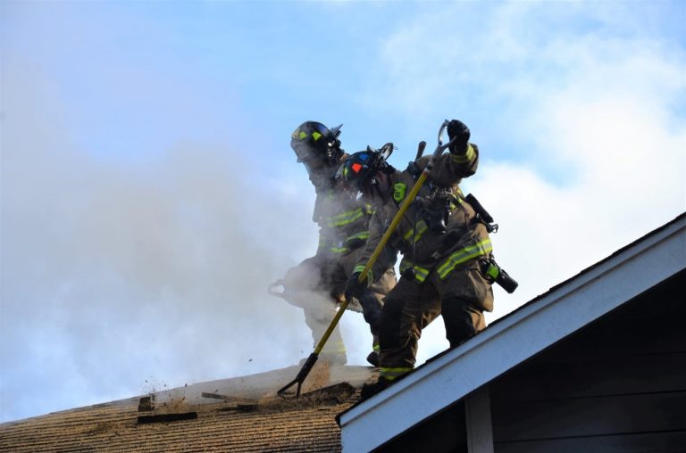 Firemen on of roof